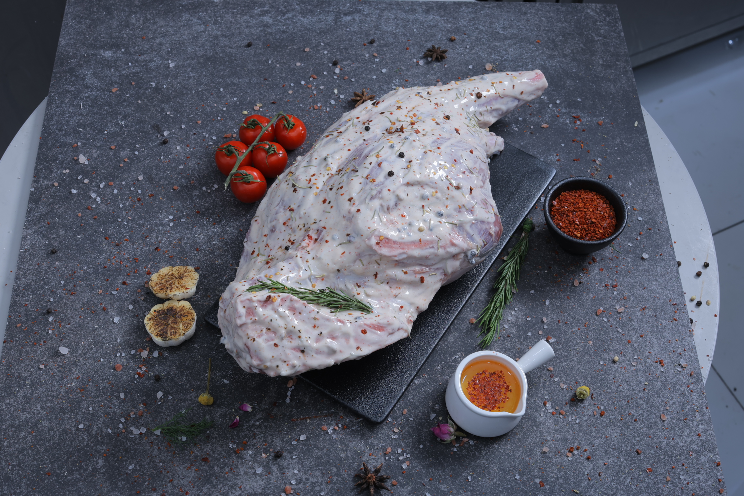 Syrian Lamb Leg Marinated - <p>Marinated Lamb Shoulder – With yogurt, butter, salt, black pepper, white vinegar, and sweet pepper; wrapped in baking paper and aluminum foil</p>